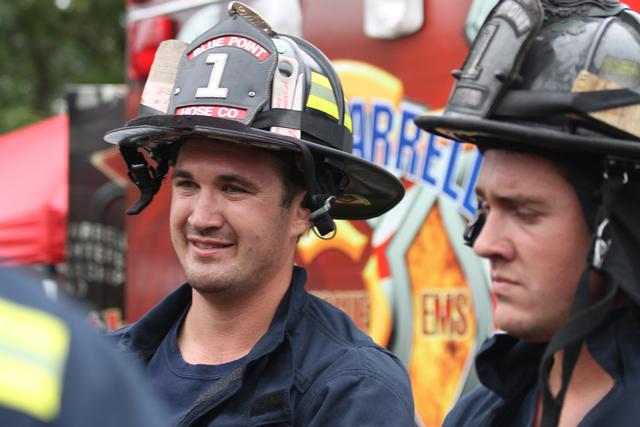 Brothers Chris and Tom Reilly attend a briefing during an alarm 